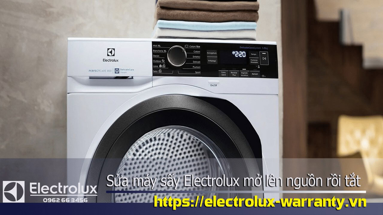 Electrolux washing machine with digital control panel and laundry load, front view.